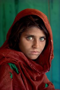 exhibition steve mccurry caen - afghan girl with green eyes to discover during your stay in a charming hotel, Normandy